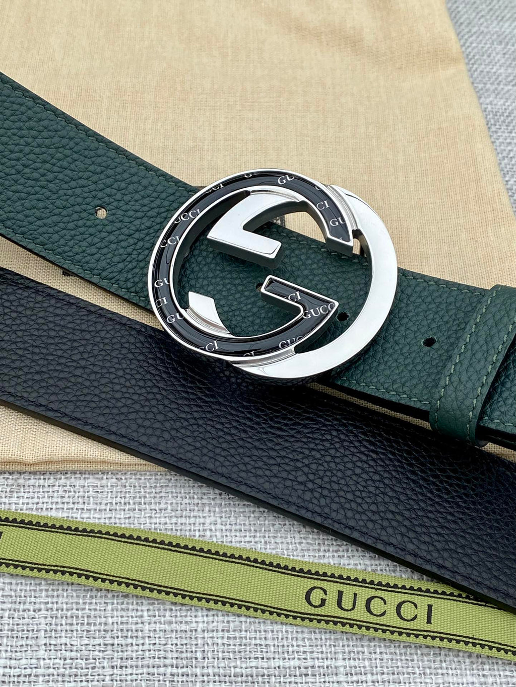 Gucci belt dark green leather with round GG buckle and textured grain