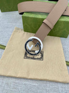Gucci belt, pale pink leather strap and round GG buckle with G centerpiece