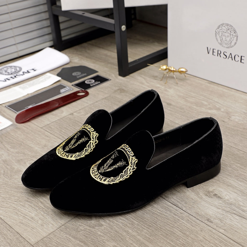 Versace black slip-on loafers with gold embroidered logo detail