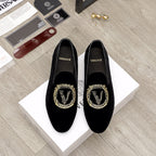 Versace black loafers with gold embroidered crest on the vamp