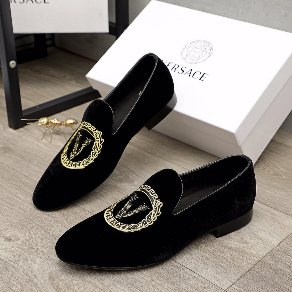 Versace black loafers with gold embroidered crest detail
