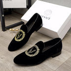 Versace black loafers with gold embroidered crest detail