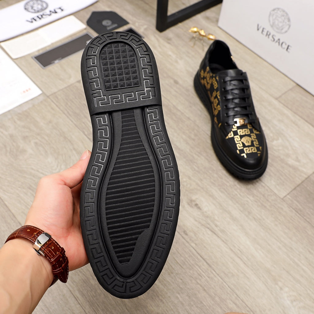 Versace sneaker outsole and shoe, black tread sole with Greek key pattern