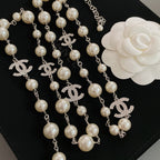 Pearl bead necklace with silver-tone chain and CC logo emblems
