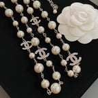 Pearl bead necklace with silver-tone chain and multiple CC logo drop charms