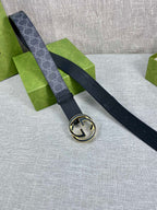 Gucci belt with dark strap and gold-tone round double G buckle