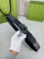Gucci belt with navy monogram strap and silver-tone double G buckle