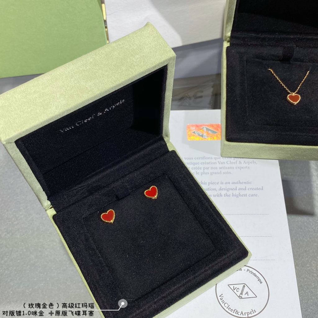 Heart charm necklace with red enamel heart pendant and gold-tone crystal halo