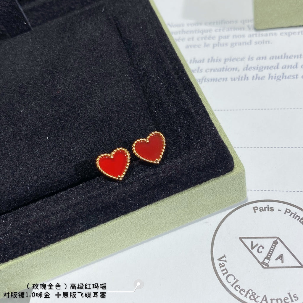 Heart stud earrings with red enamel hearts and gold-tone crystal edging