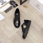 Black Versace sneakers, lace-up with embossed leather and gold emblem patch