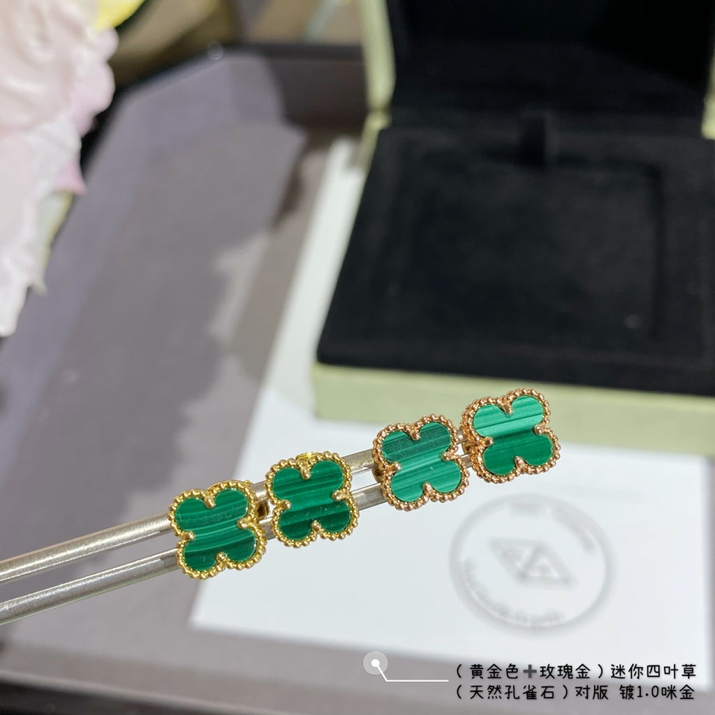 Van Cleef & Arpels clover stud earrings, teal-green enamel on gold-tone posts