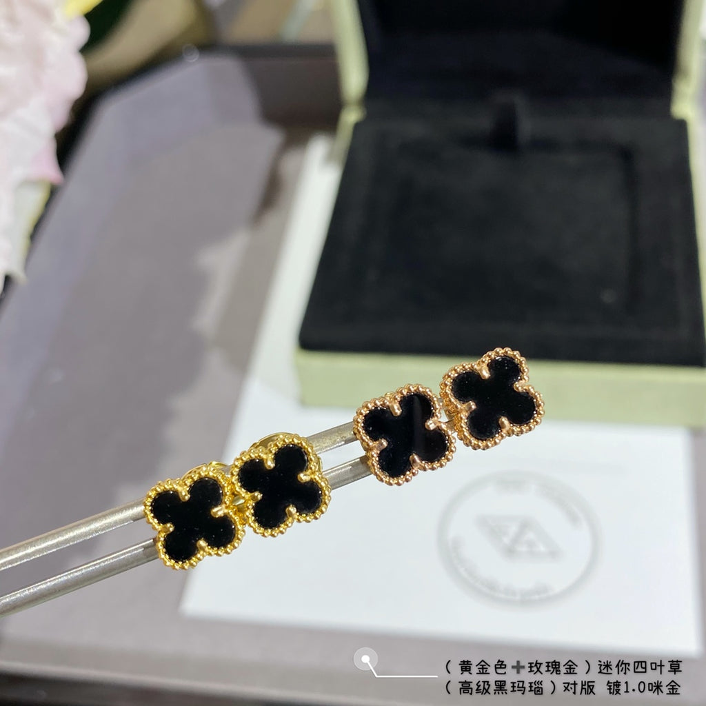 Van Cleef & Arpels clover stud earrings, black enamel on gold-tone posts