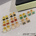Van Cleef & Arpels clover stud earrings, gold-tone with mixed enamel colors