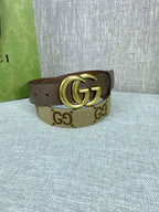 Gucci belt with beige GG canvas strap and gold double-G buckle