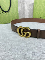 Gucci belt with dark brown leather strap and gold double-G buckle