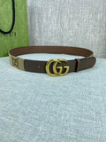 Gucci belt with beige GG canvas strap, dark brown edges, gold double-G buckle