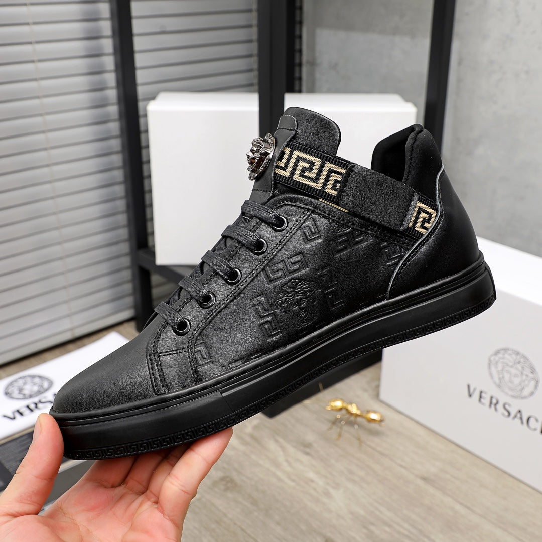 Black Versace high-top sneaker with cushioned collar and textured logo upper