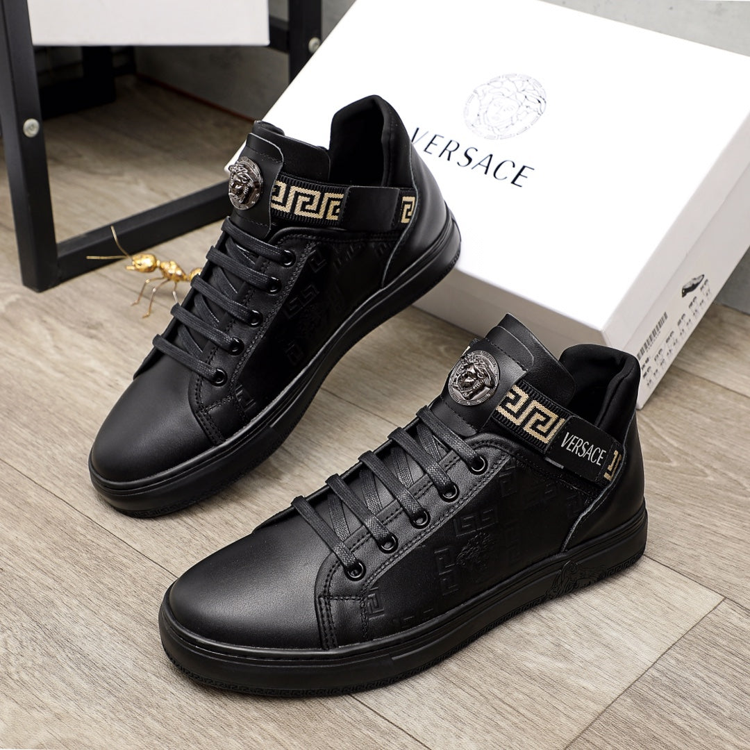 Black Versace high-top sneakers with logo strap and metal side emblem