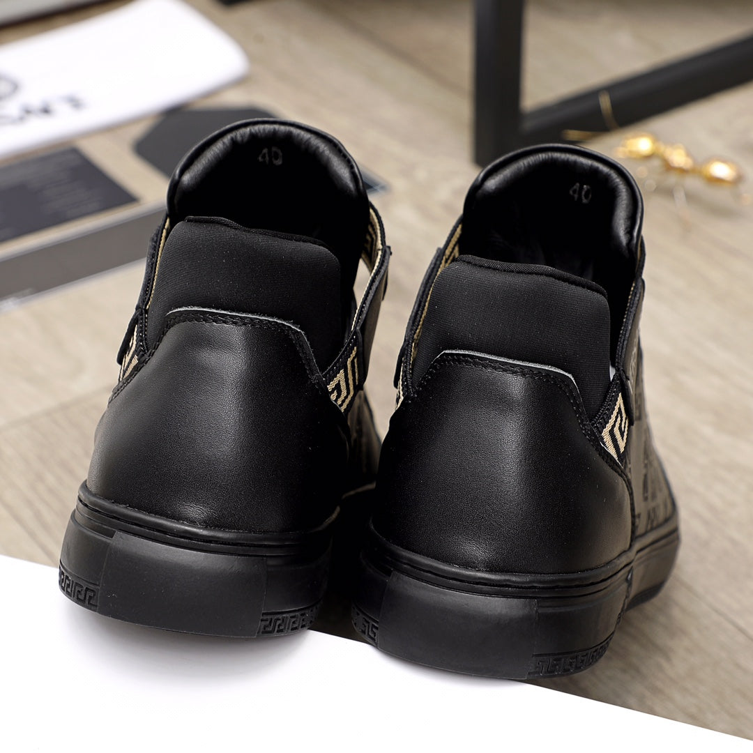 Black Versace sneakers showing back heel and cushioned collar
