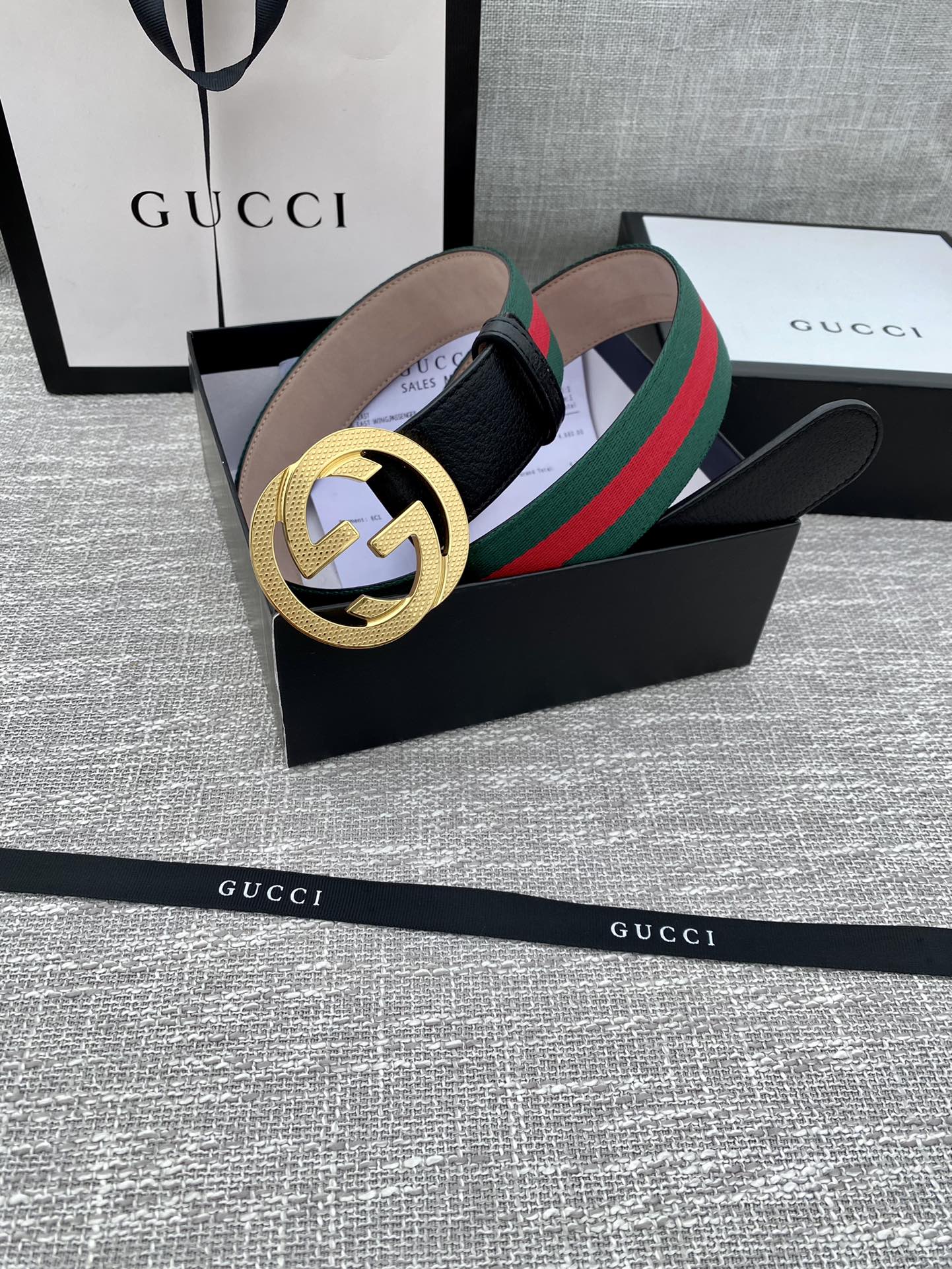 Leather belt with gold GG buckle, black strap, green and red web stripe