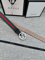 Black leather belt with silver GG buckle and green-red web stripe edge