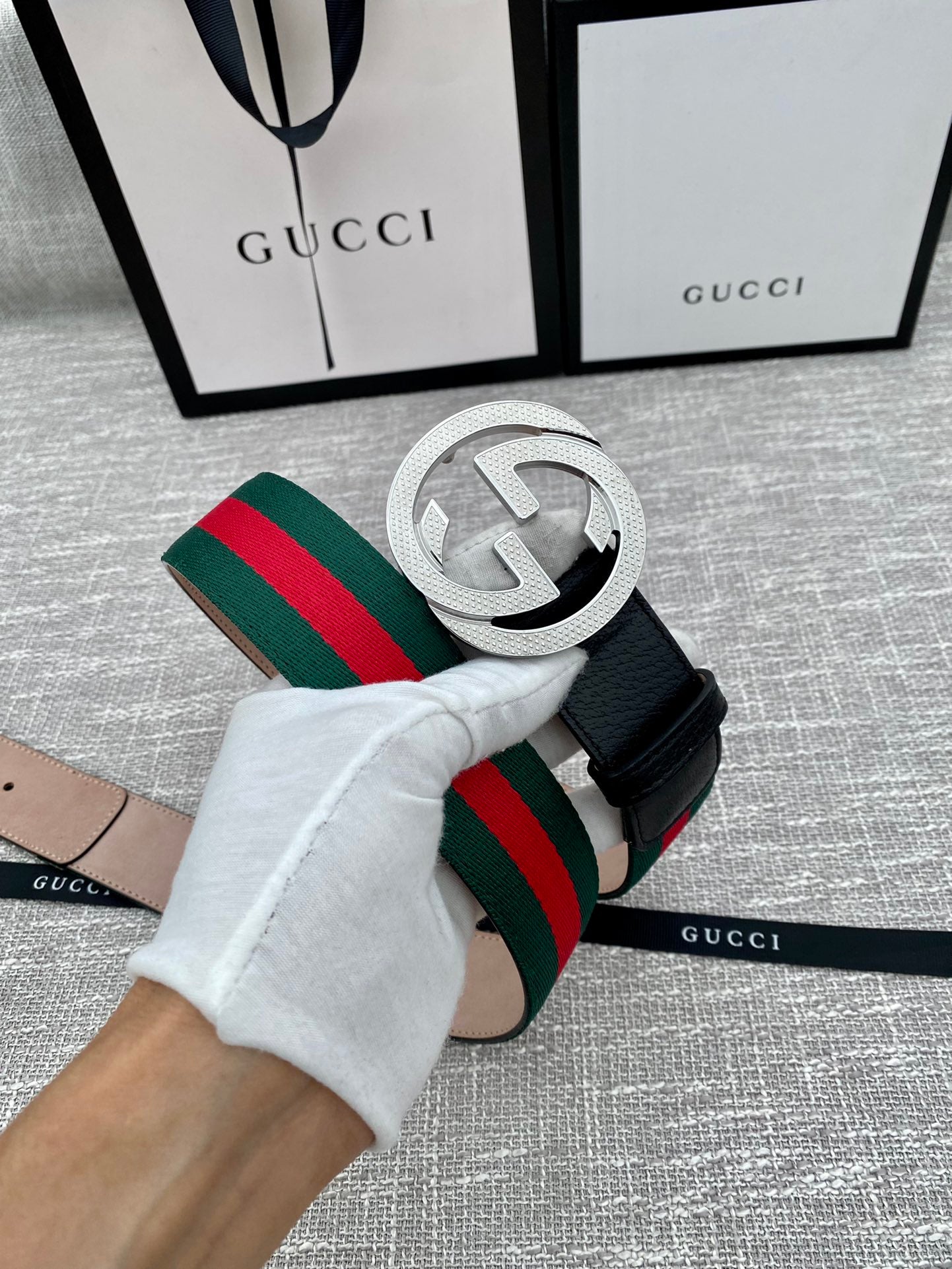 Leather belt with silver GG buckle, black strap, green and red web stripe