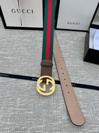 Brown leather belt with gold-tone GG buckle and green/red web stripe, end with holes