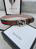 Gucci belt with brown leather strap, silver-tone double G buckle, and green-red stripe web trim.