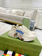 White Gucci unisex lace-up sneakers with 'FLASH' comic graphic on side