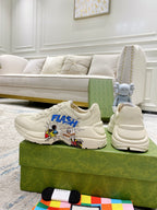 White Gucci unisex sneakers with 'FLASH' comic print