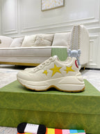 Gucci unisex sneakers, white with triple yellow star motif and cushioned sole