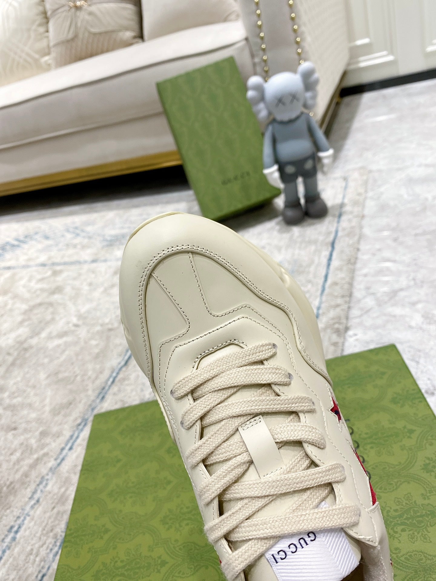 Gucci unisex white sneaker toe and laces, red star accent on side