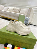 Gucci white leather lace-up sneakers with textured side panel