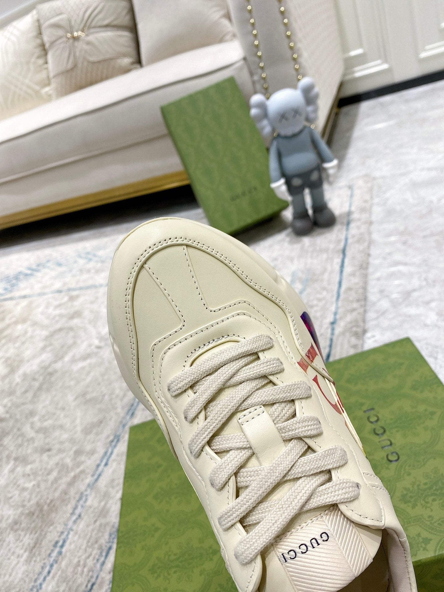 Gucci unisex luxury sneaker toe and laces, white leather look with stitched panels