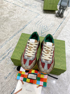 Pair of Gucci sneakers on box: beige GG canvas, red accents, green lining, white laces