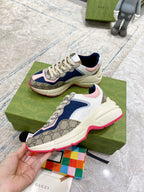 Gucci unisex luxury sneaker with beige laces, blue and pink upper, cream sole