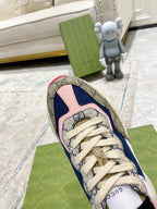 Gucci unisex luxury sneaker toe detail, blue and pink panel with beige logo trim
