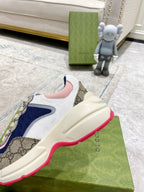 Gucci unisex luxury sneaker side profile with pink collar trim and beige sole