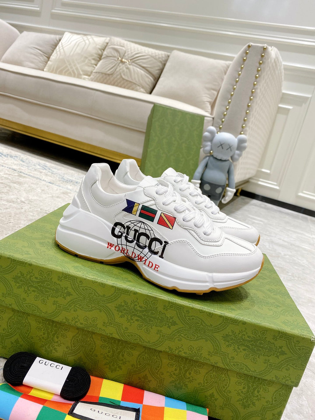 White Gucci unisex sneakers with multicolor logo and gum sole