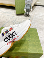 White Gucci unisex sneaker with multicolor crest and WORLDWIDE text