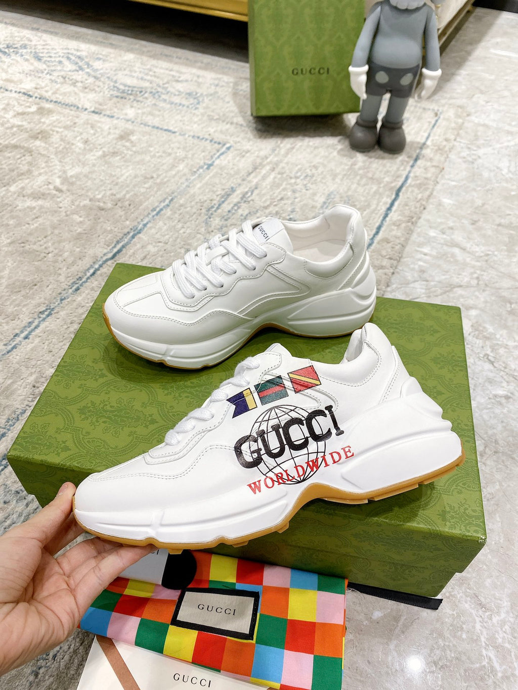 White Gucci unisex sneakers with multicolor logo patch and gum sole
