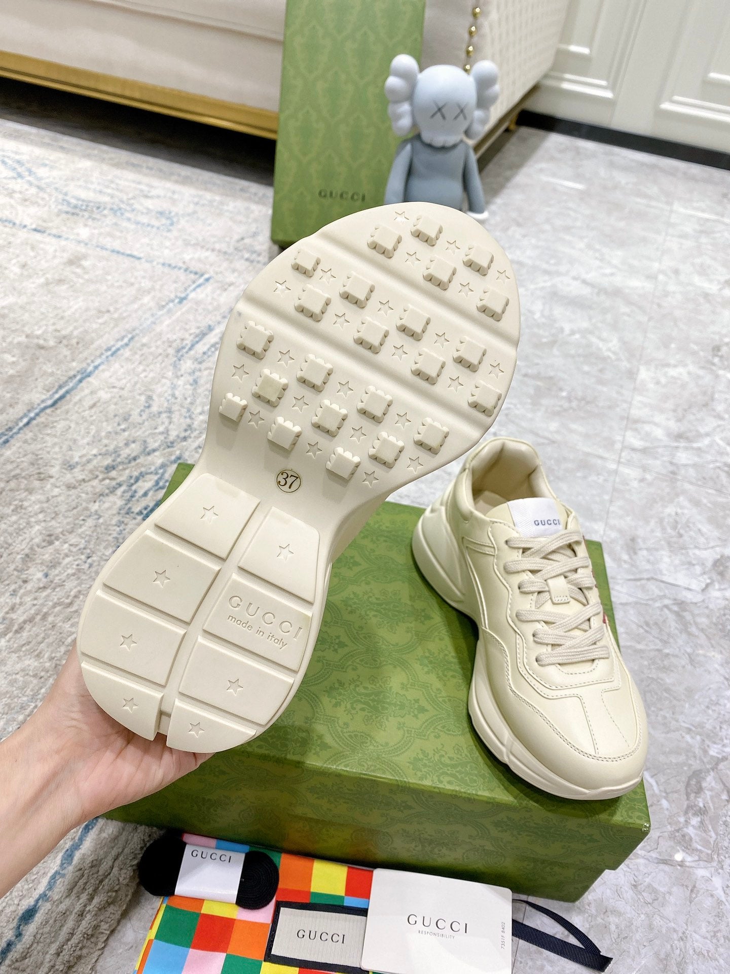 Gucci unisex sneakers, white outsole tread and side view