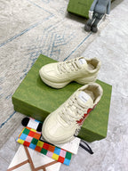 Gucci unisex sneakers, white low-top pair with red floral side graphic