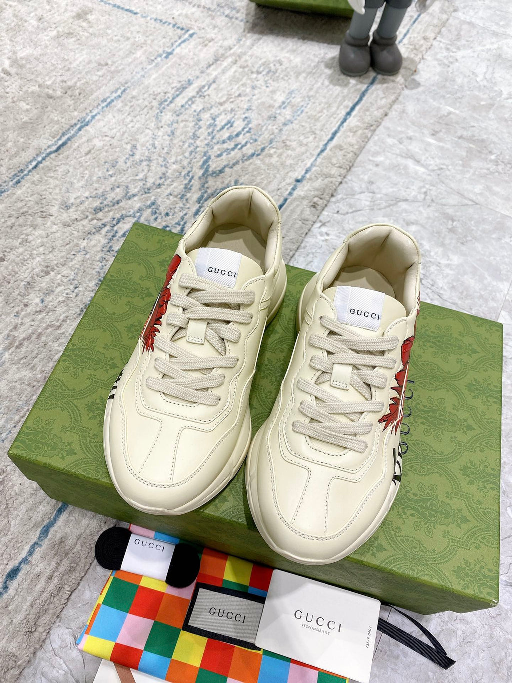 Gucci unisex low-top sneakers, white with red floral accents and lace-up
