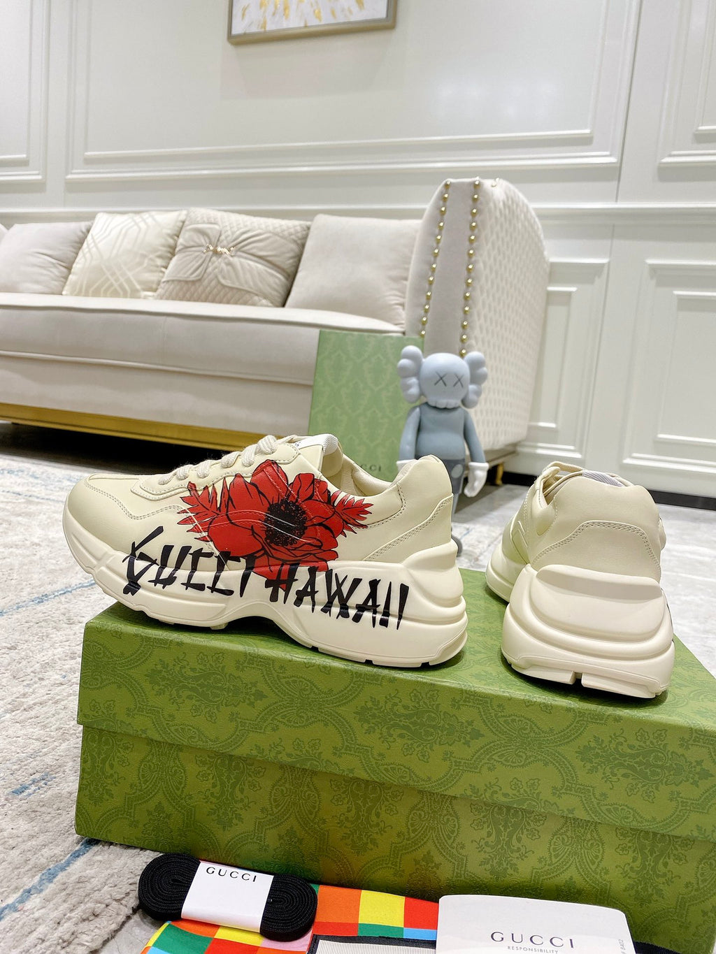 Gucci unisex sneakers, white with red floral emblem and black side lettering detail