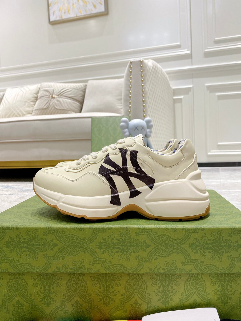 Gucci unisex sneakers, light cream uppers with bold black NY logo on side