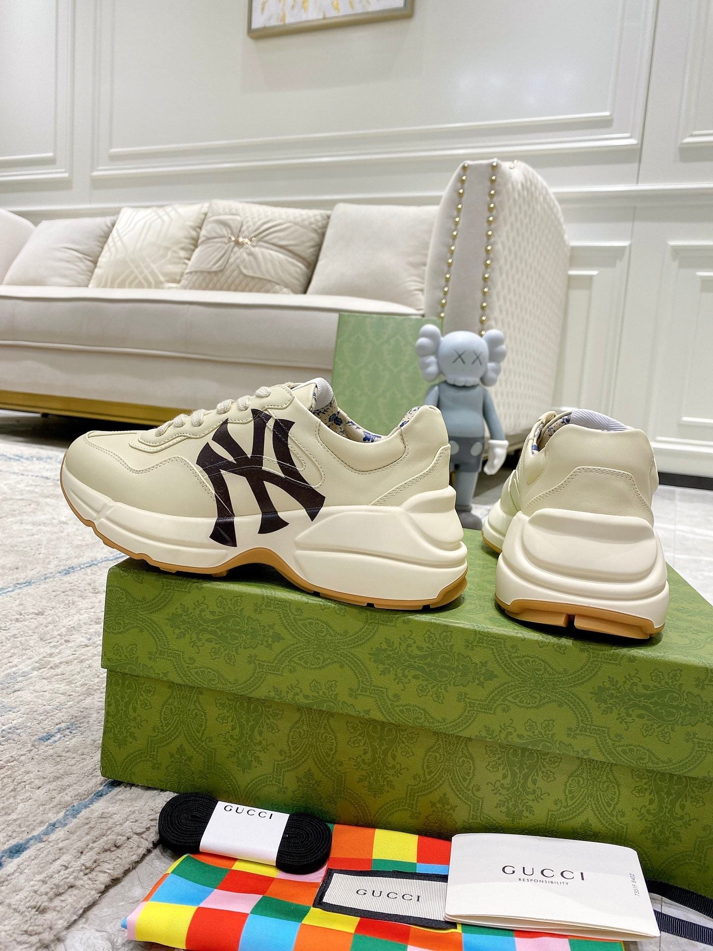 Gucci unisex sneakers pair in light cream with black NY logo and chunky sole