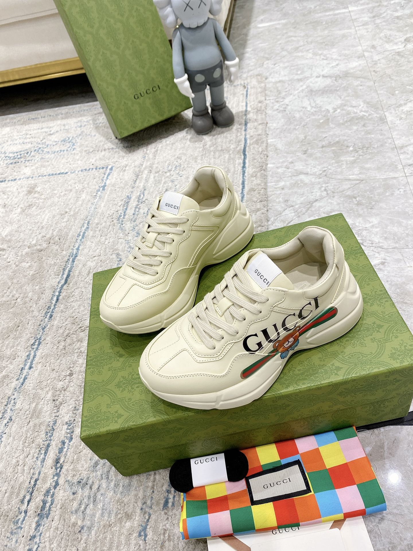 Gucci unisex luxury sneakers, white lace-up with multicolor stripe accents
