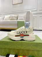 Gucci unisex luxury sneakers, white with GUCCI print and bear graphic