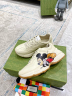 Gucci unisex sneakers, cream leather with Mickey Mouse graphic and gum-colored sole